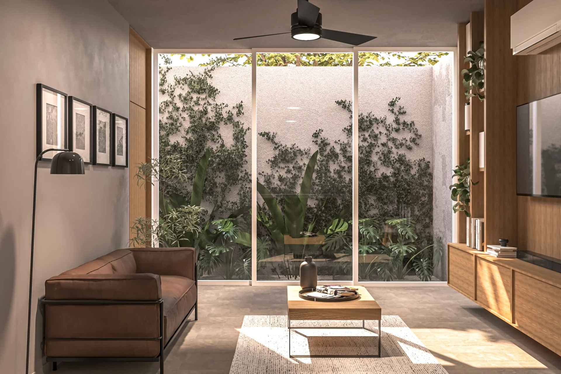 Sala abierta al jardín a través de puertas de cristal